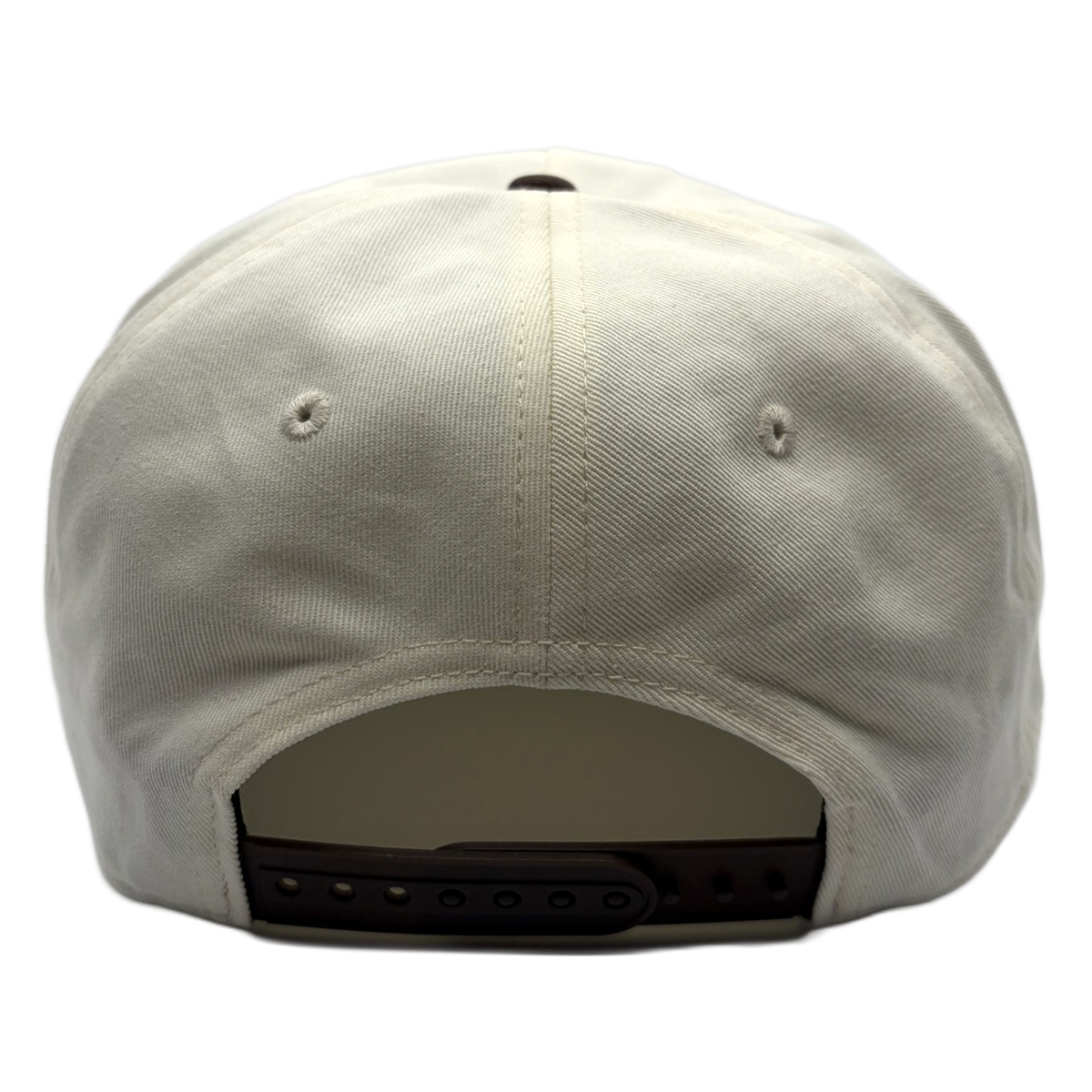 Classic style meets course-ready comfort. This cream and brown Coyote Springs cap features premium raised embroidery and a timeless two-tone design perfect for the golf course or everyday wear.