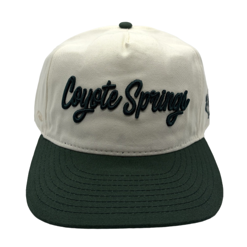 Classic style meets course-ready comfort. This cream and green Coyote Springs cap features premium raised embroidery and a timeless two-tone design perfect for the golf course or everyday wear.