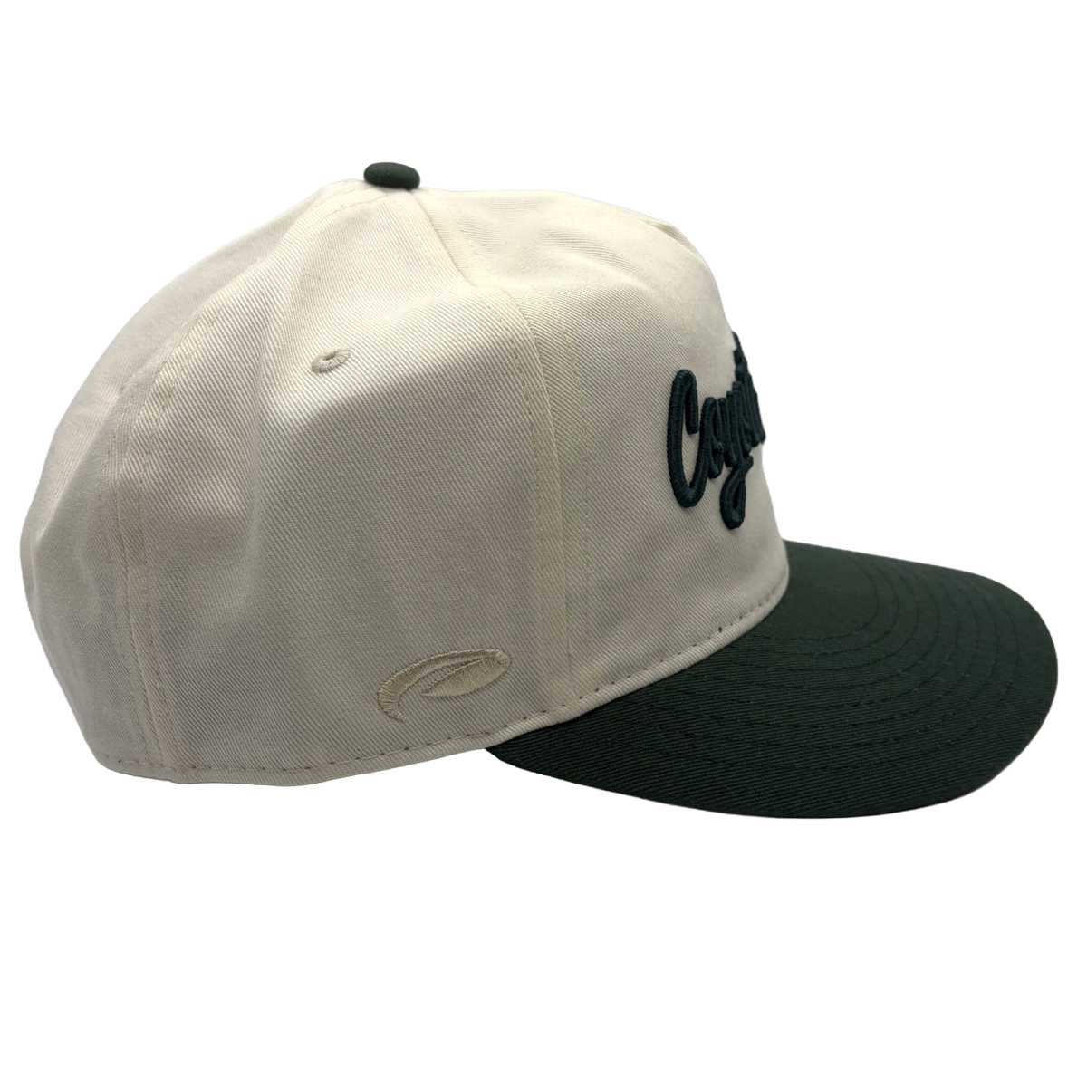 Classic style meets course-ready comfort. This cream and green Coyote Springs cap features premium raised embroidery and a timeless two-tone design perfect for the golf course or everyday wear.